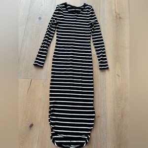 Black and white striped form fitting dress. Great condition!